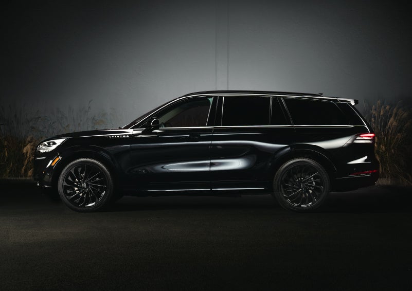 A 2024 Lincoln Aviator® SUV is shown in the Infinite Black exterior color | Empire Lincoln of Huntington in Huntington NY