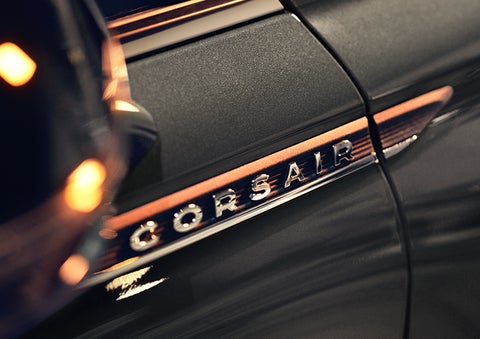 The stylish chrome badge reading “CORSAIR” is shown on the exterior of the vehicle. | Empire Lincoln of Huntington in Huntington NY