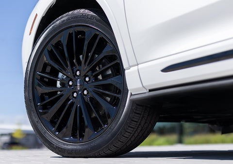 The stylish blacked-out 20-inch wheels from the available Jet Appearance Package are shown. | Empire Lincoln of Huntington in Huntington NY