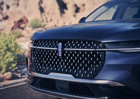 The stylish grille of a 2024 Lincoln Nautilus® SUV sparkles in the sunlight. | Empire Lincoln of Huntington in Huntington NY