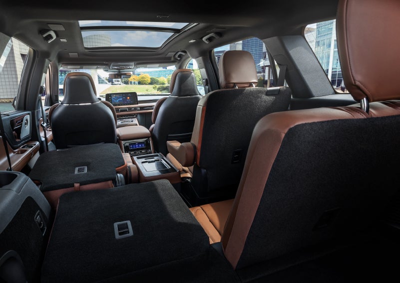 The interior of the 2025 Lincoln Aviator® SUV is shown with two seats folded down for added space. | Empire Lincoln of Huntington in Huntington NY