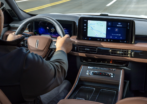A person is driving a 2025 Lincoln Aviator® SUV from inside the cabin. | Empire Lincoln of Huntington in Huntington NY