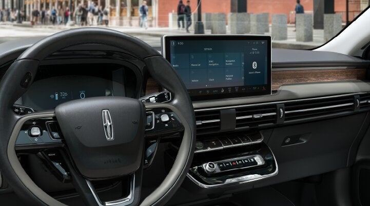 The center screen of the new 2025 Lincoln Corsair® SUV is showcased with its SYNC® 4 capabilities highlighted | Empire Lincoln of Huntington in Huntington NY