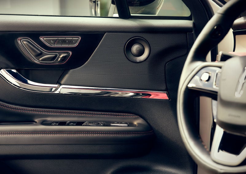 An audio speaker is shown in the driver's side door of a 2024 Lincoln Corsair® SUV. | Empire Lincoln of Huntington in Huntington NY