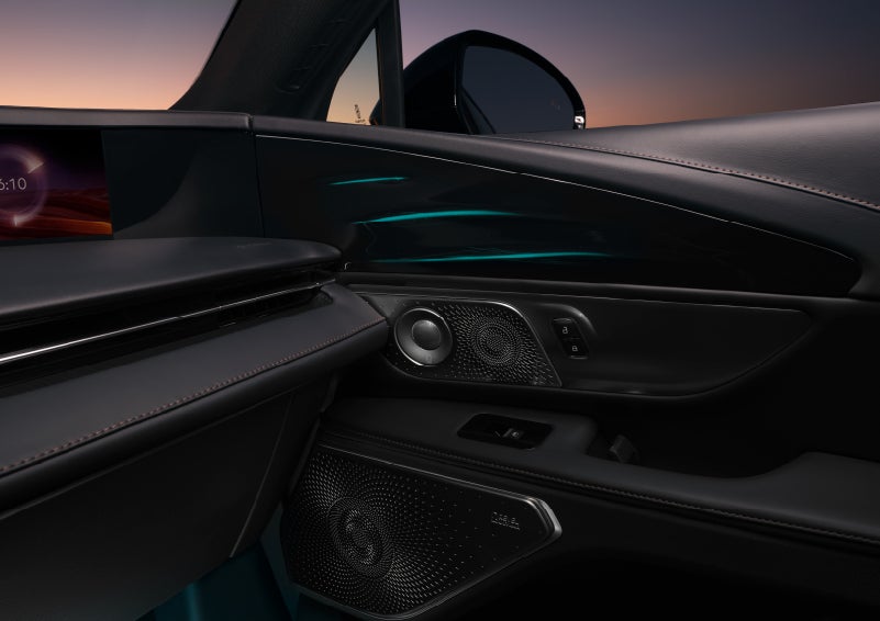 Selectable ambient lighting glows in the passenger door panel. | Empire Lincoln of Huntington in Huntington NY