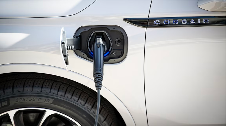 An electric charger is shown plugged into the charging port of a Lincoln Corsair® Grand Touring
model. | Empire Lincoln of Huntington in Huntington NY