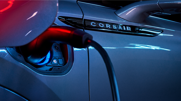 A charger plugged into the charging port of a 2025 Lincoln Corsair® Plug-in Hybrid model. | Empire Lincoln of Huntington in Huntington NY