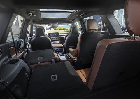 One side of the PowerFold® third-row seat and a second-row seat are folded forward in the 2026 Lincoln Aviator® SUV. | Empire Lincoln of Huntington in Huntington NY