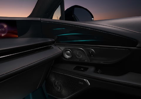 Selectable ambient lighting glows in the passenger door panel. | Empire Lincoln of Huntington in Huntington NY