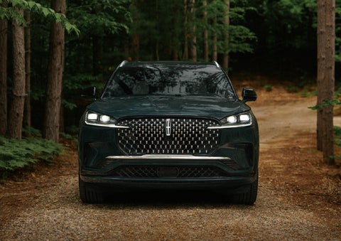 The front grille of a 2027 Lincoln Aviator® Black Label™ SUV is shown. | Empire Lincoln of Huntington in Huntington NY