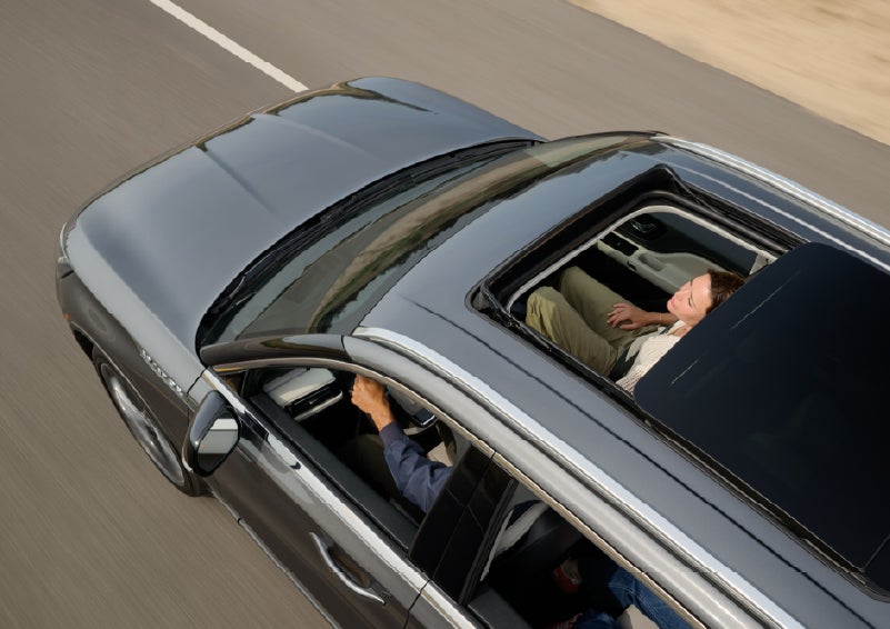 The available panoramic Vista Roof® of a 2027 Lincoln Aviator® SUV is open. | Empire Lincoln of Huntington in Huntington NY